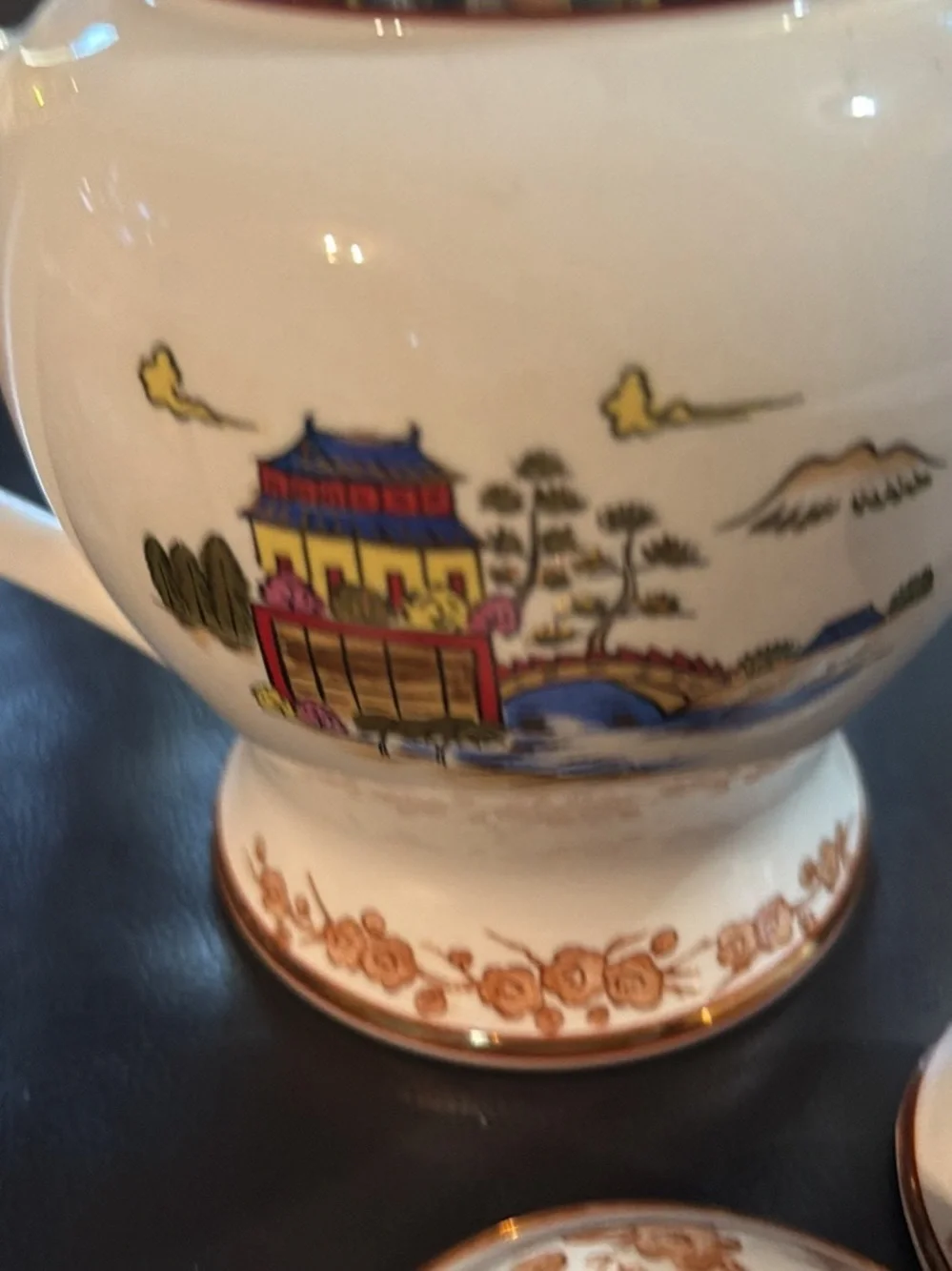 White Ceramic Tea Set with Gold Trim and Oriental Scenic Design